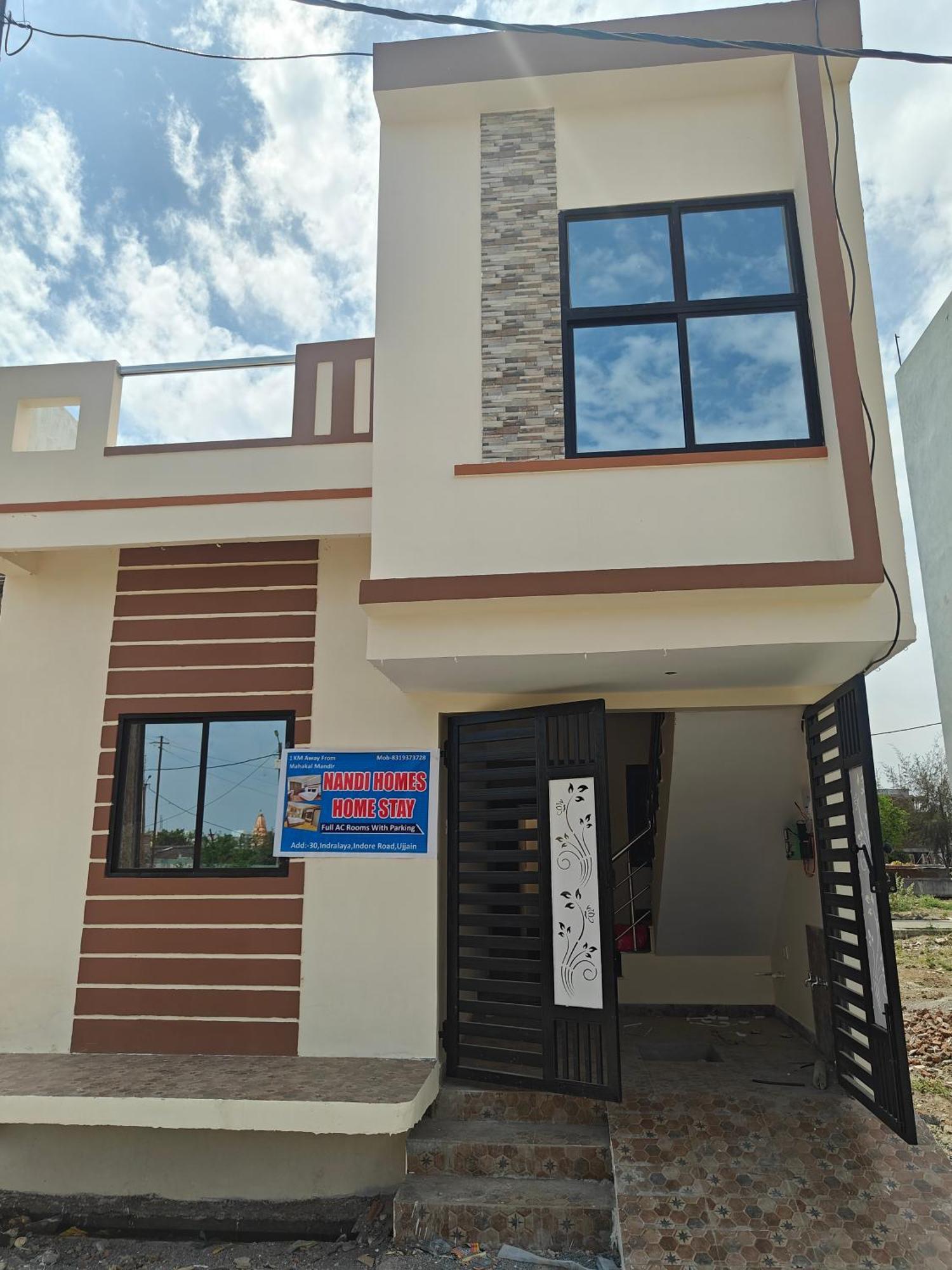 Nandi Homes Homestay Ujjain Eksteriør billede